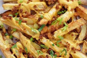 Best Vegan Cheese Fries Recipes: Easy & Cheesy! | Discover Delicious Vegan Food, Beauty Swaps, and Zero-Waste Tips for a Greener Life